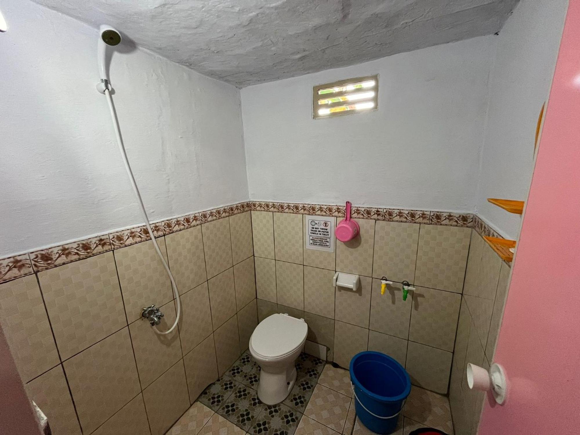El Homestay Бунакен Экстерьер фото