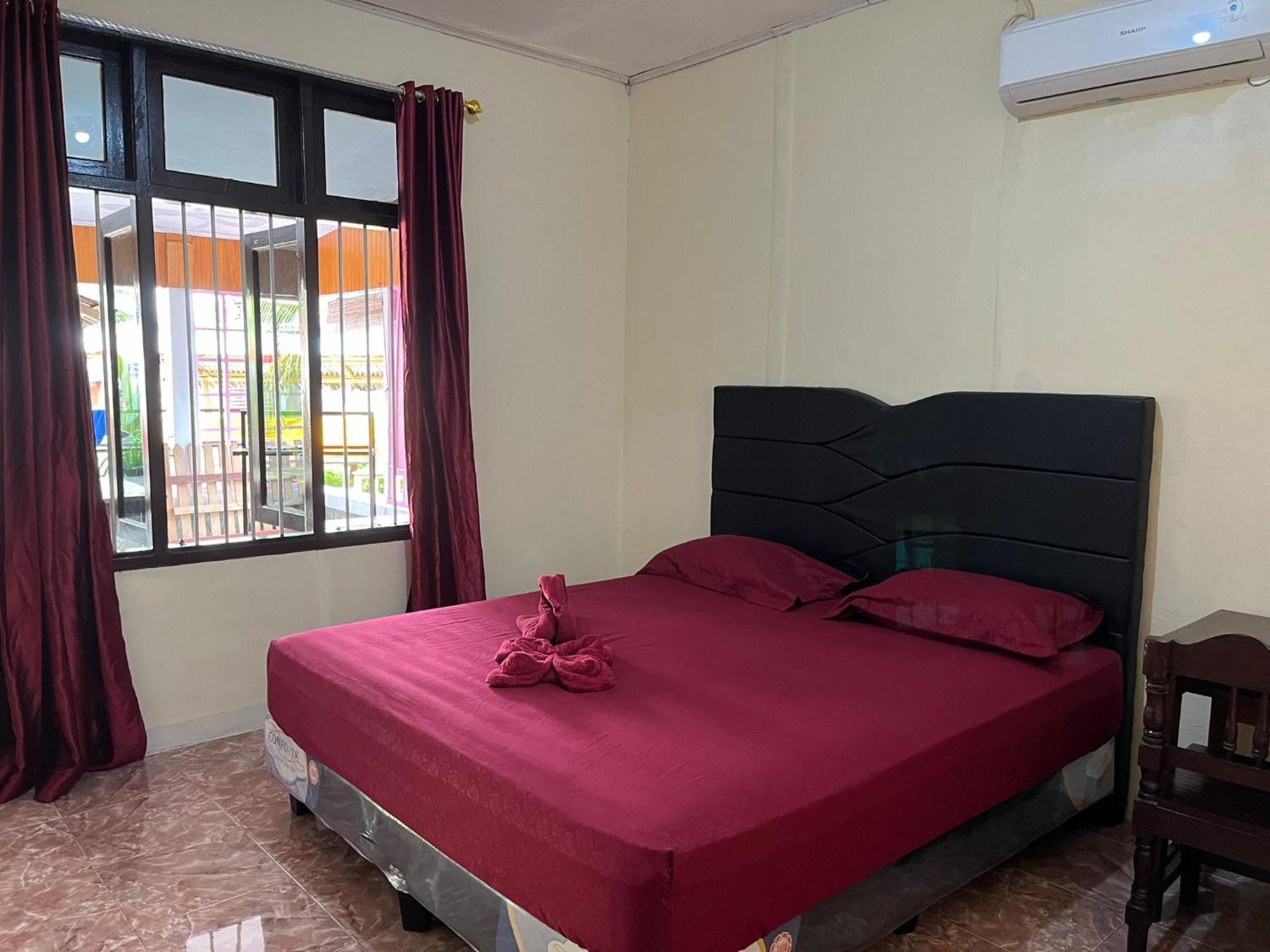 El Homestay Бунакен Экстерьер фото